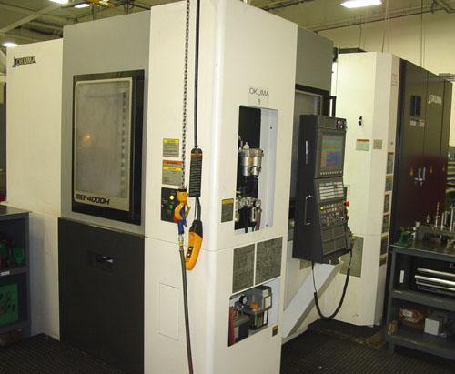 OKUMA MB-4000H CNC HORIZONTAL MACHINING CENTER, OSP -P300M CNC Control, X=22.05", Y=22.05", Z=24.61", Cat-40 Taper, 22 HP, 15000 Max Spindle RPM, ATC, Chip Conveyor, Coolant System, New 2013.