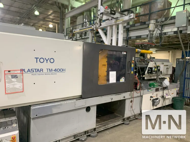 400 TON 45.3 OZ TOYO MODEL TM-400H INJECTION MOLDING MACHINE MFG 2000