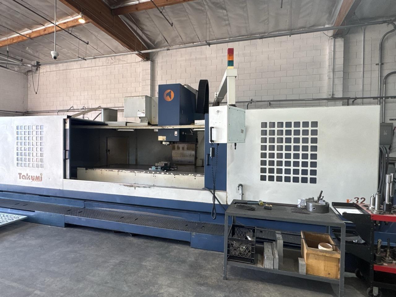 Takumi V32 VMC, 2007 – 4th Axis, CAT50, Box Way, TSC, Chip Conveyor