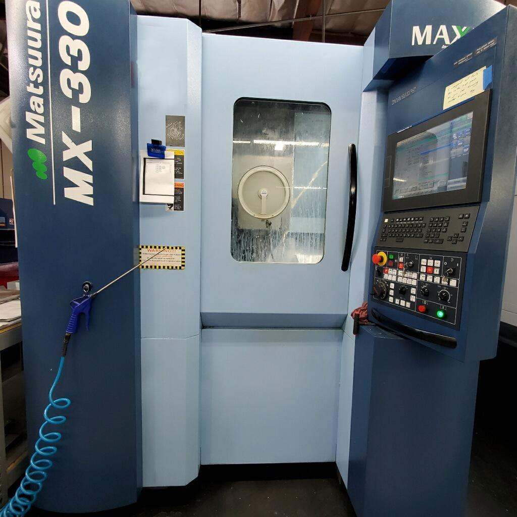 Matsuura MX-330 5-Axis VMC 2016, with: Fanuc 31i CNC Control, 60 Tool ATC, Spiral Chip Augers, CAT 40 Big Plus, Coolant Through Spindle, LNS Chip Conveyor.