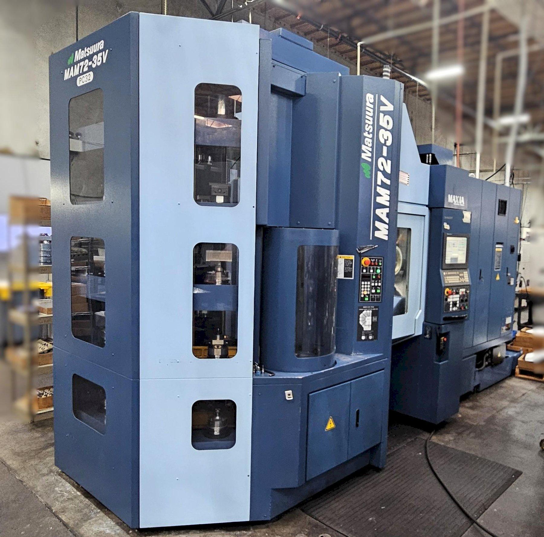 Matsuura MAM72-35V CNC Vertical Machining Center 2014 equipped with 5th-Axis Trunnion Table, High-Pressure Thru-Spindle Coolant 1000 PSI, Cool-Jet System Coolant Chiller, Blum Laser Control NT, 32-Pal