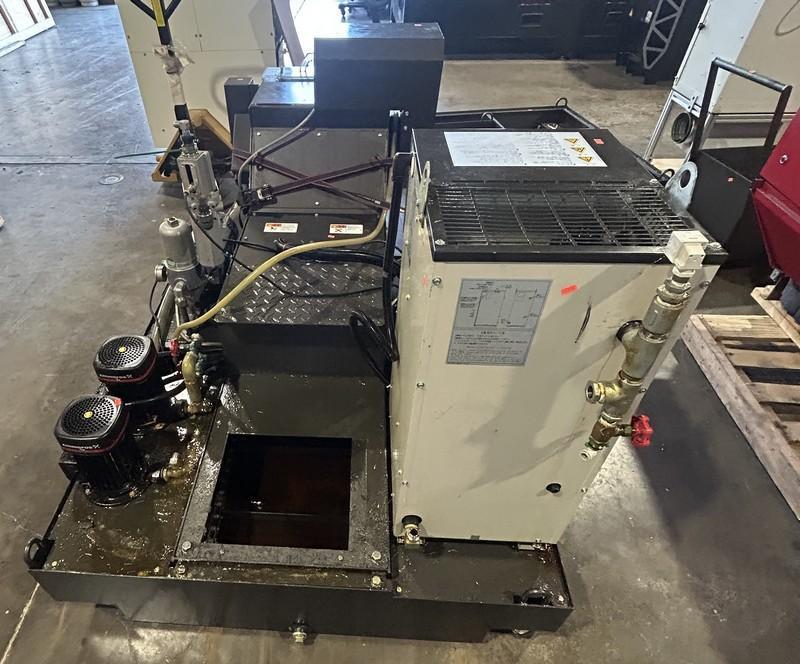 Kitamura Medcenter5AX Vertical Machining Center w/ Arumatik Mi Control, 300-30,000 RPM Direct Drive Spindle, Spindle Oil Cooler, Renshaw NC4+ Blue F115C Probe, High Capacity 40 Tool ATC w/ 120 ATC Upgrade, Raptor SP1882 Tombstone w/ (4) Raptor Vices RWP019SS, Scraper Type Chip Conveyor