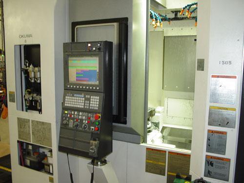 OKUMA MB-4000H CNC HORIZONTAL MACHINING CENTER, OSP -P300M CNC Control, X=22.05", Y=22.05", Z=24.61", Cat-40 Taper, 22 HP, 15000 Max Spindle RPM, ATC, Chip Conveyor, Coolant System, New 2013.