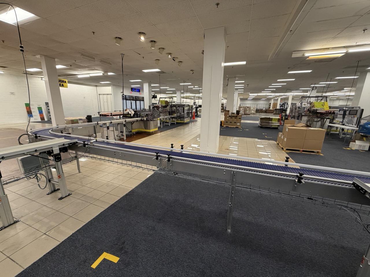 Complete Packaging Line for trays / flat Product including Custom Conveyor System, (2) Texwrap L-Bar Sealers and Heat Tunnels, Econocorp Automatic Cartoner and Case Packer and CTM Case labeler, 2023