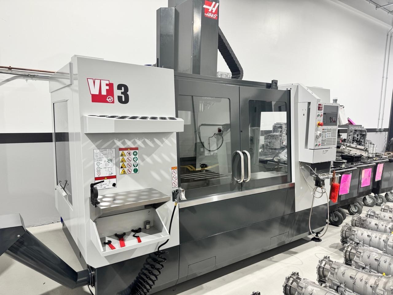 Haas VF-3 VMC, 2020 – Renishaw Probe, 4th Axis Wired, Chip Auger, Used For Testing Only – Never Ran Production