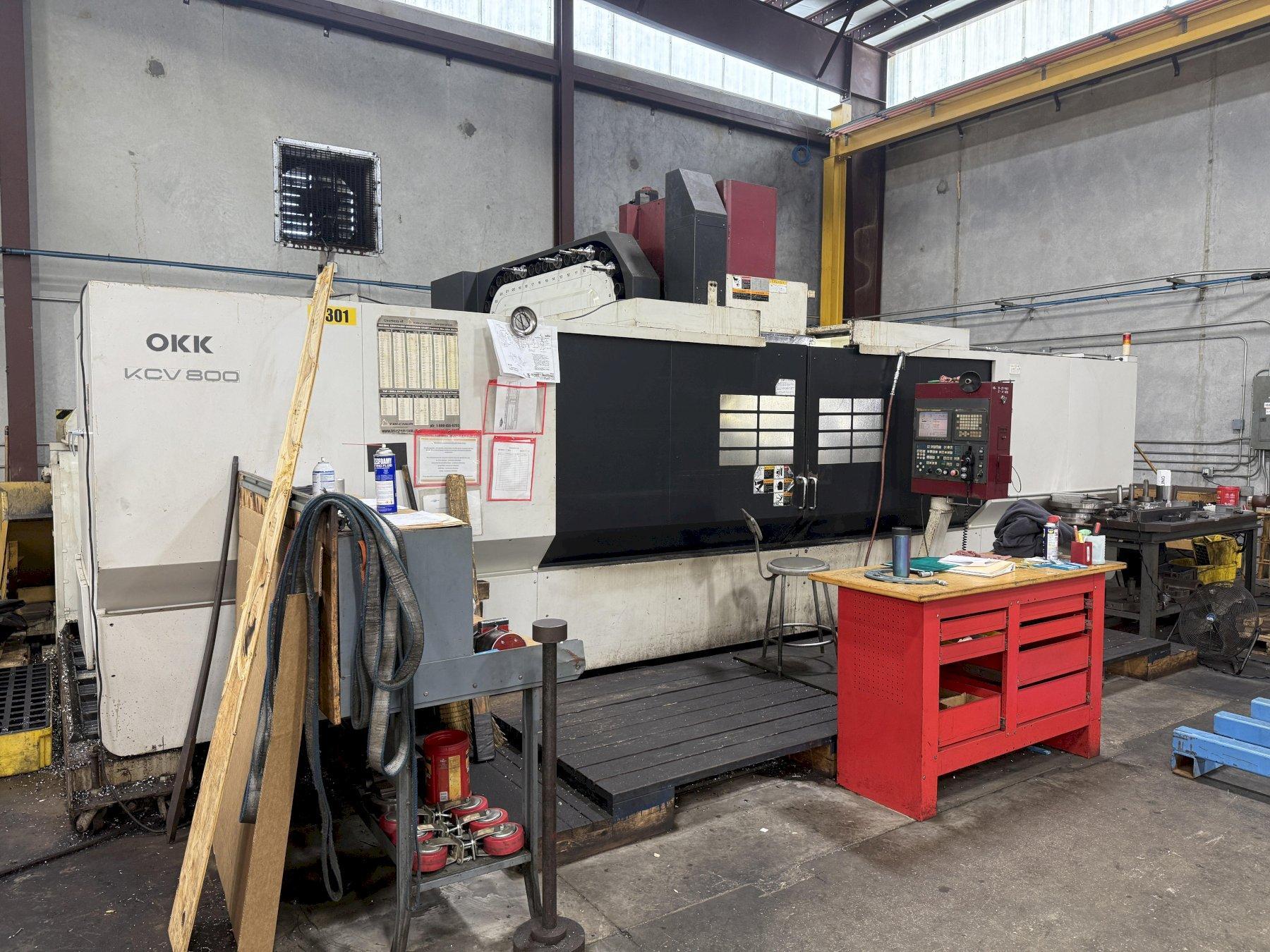 OKK, MODEL KCV 800 CNC VERTICAL MACHINING CENTER, 120" X, 33" Y, 28" Z, 40 ATC, 12,0000 RPM, 2007, EXC.