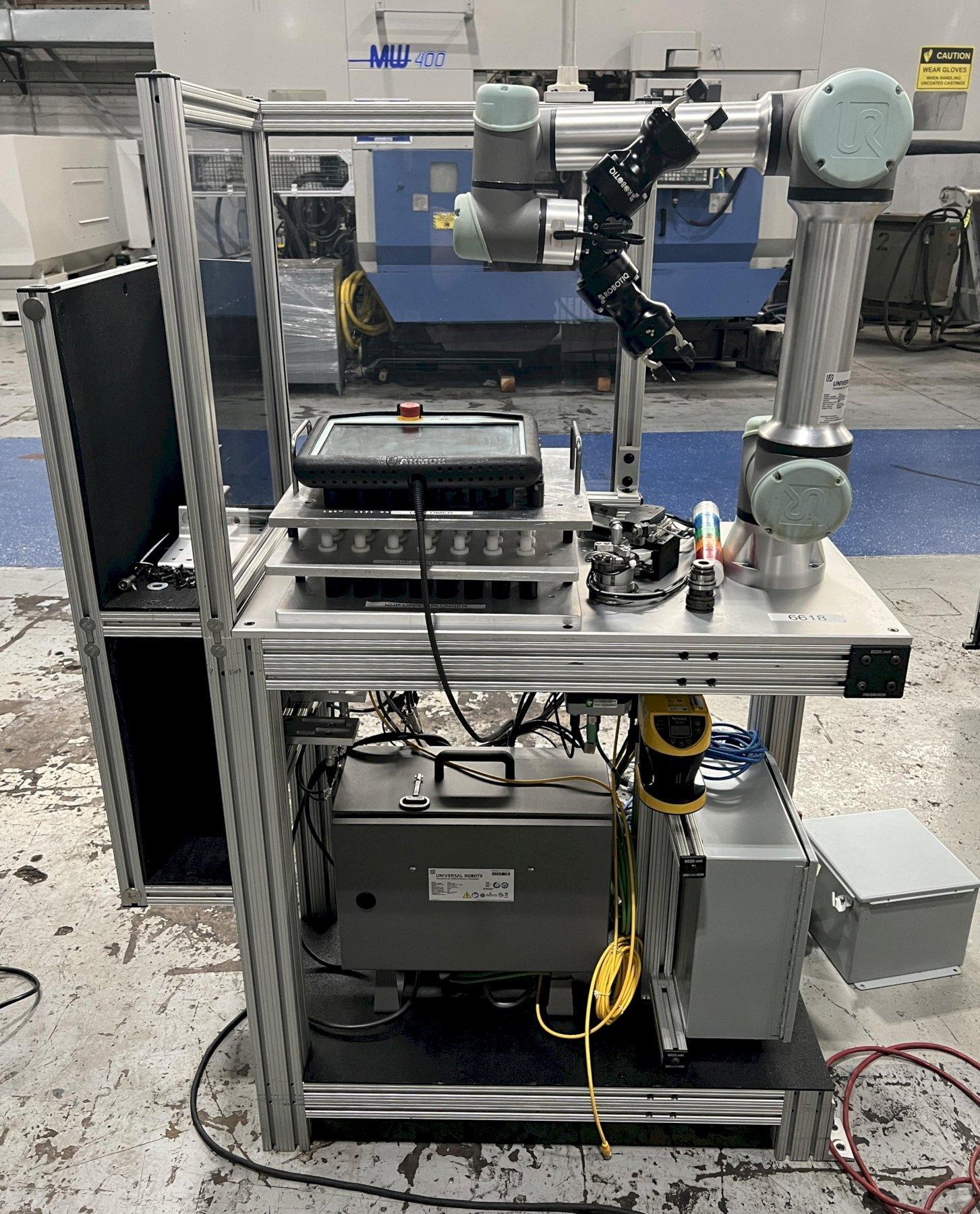 Universal Robots UR5e Cobot With Parts loading base/station. New-2020