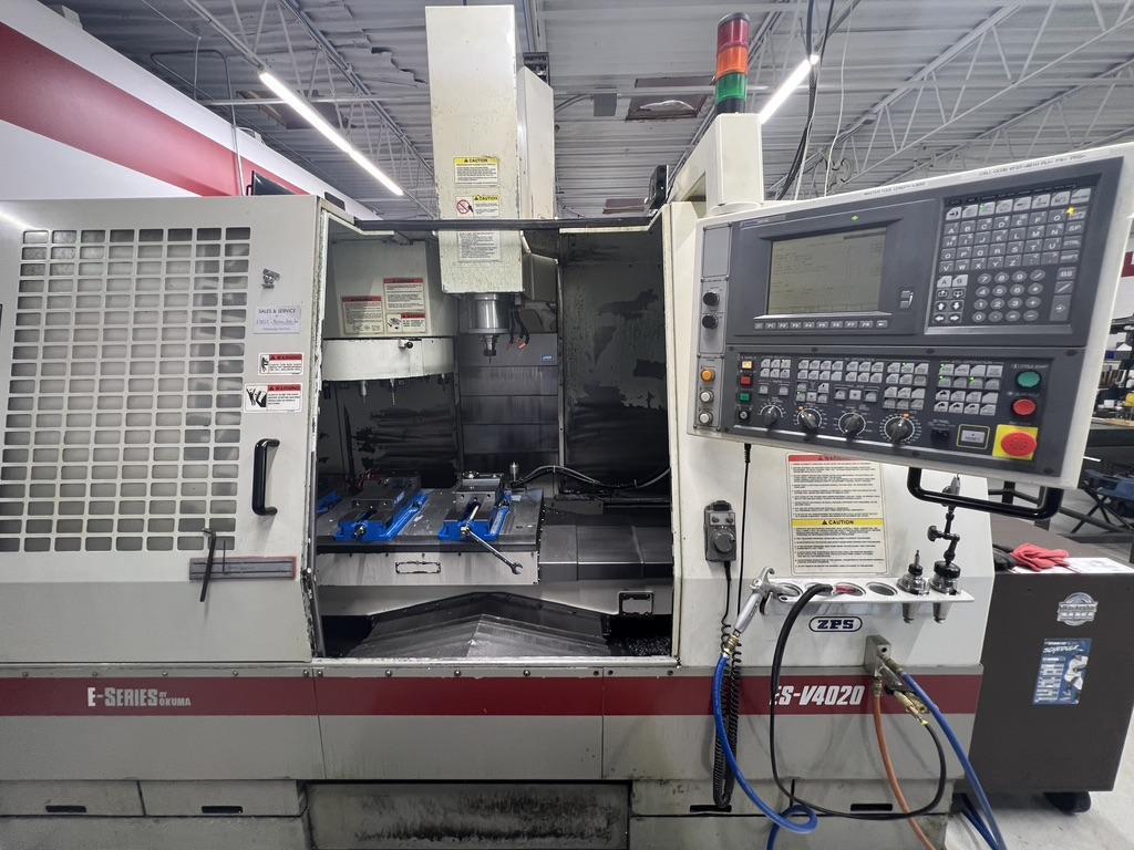 OKUMA MODEL ES-4020 VERTICAL MACHINING CENTER, 20' x 40" travels, 20 ATC, THRU SPINDLE COOLANT AND AIR, FREE LOADING, RUNS GREAT, OKUMA OSP 10M CONTROL.