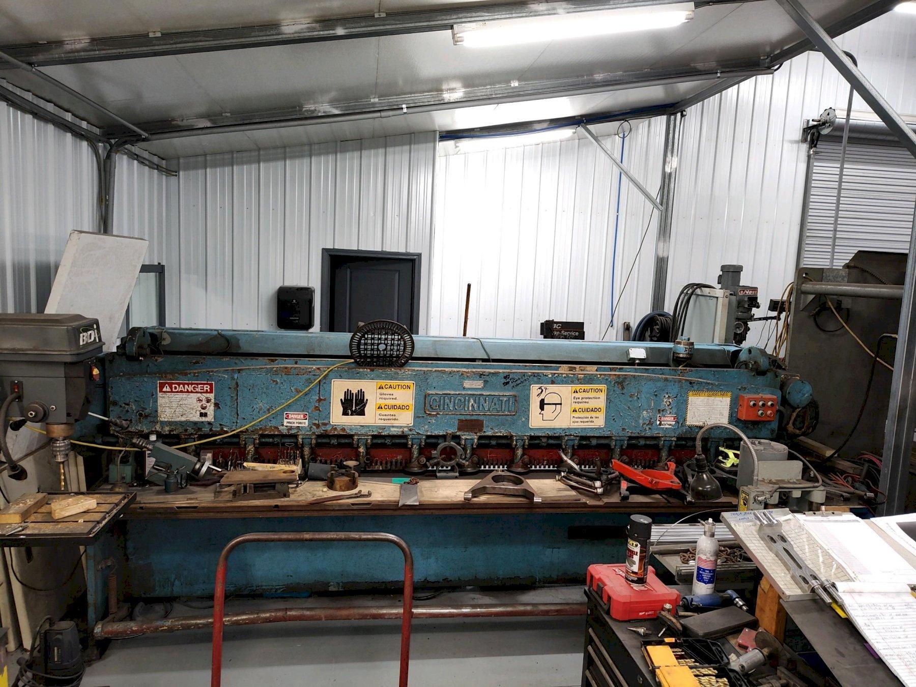 12' X 10 GA CINCINNATI 1210 MECHANICAL SQUARING SHEAR. STOCK # 1262322