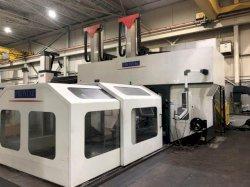 Promac Zephyr VTT Dual Head Bridge Mill with (1) Roughing Head and (1) 5 axis Finishing Head