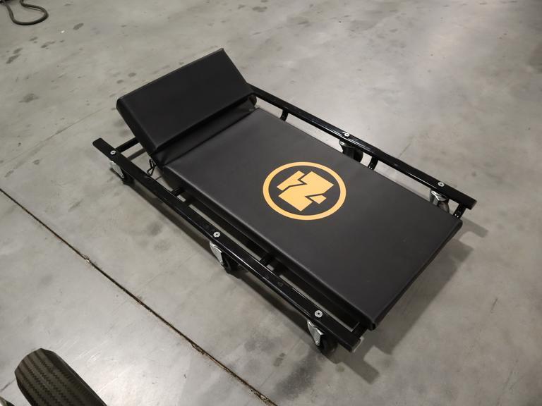 Northern Tool 44"L,  Wide Cushion Creeper with 6 Swivel Wheels and Adjustable Head Rest- Auction Item