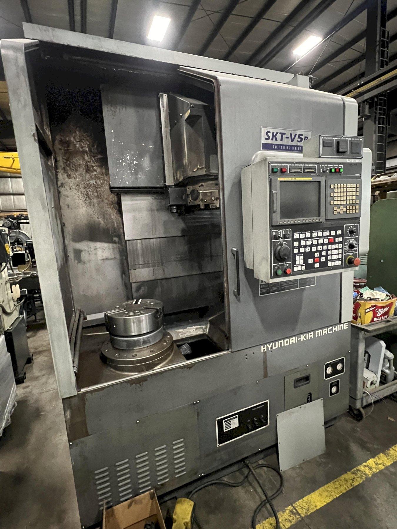 HYUNDAI KIA 31.5" CNC VTL WITH LIVE TOOLING AND 15" 3 JAW CHUCK, FANUC 21iT CONTROL, MODEL SKT-V5RM, NEW 2009