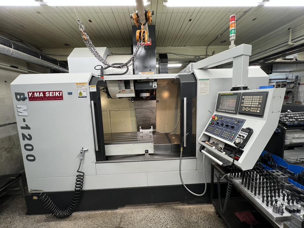 YAMA SEIKI BM-1200 VERTICAL MACHINING CENTER,  47 X 23.5 X 23.5 TRAVELS,  CAT. 40, 8,000 RPM, 36 ATC, FANUC Oi, SCALES, 2012