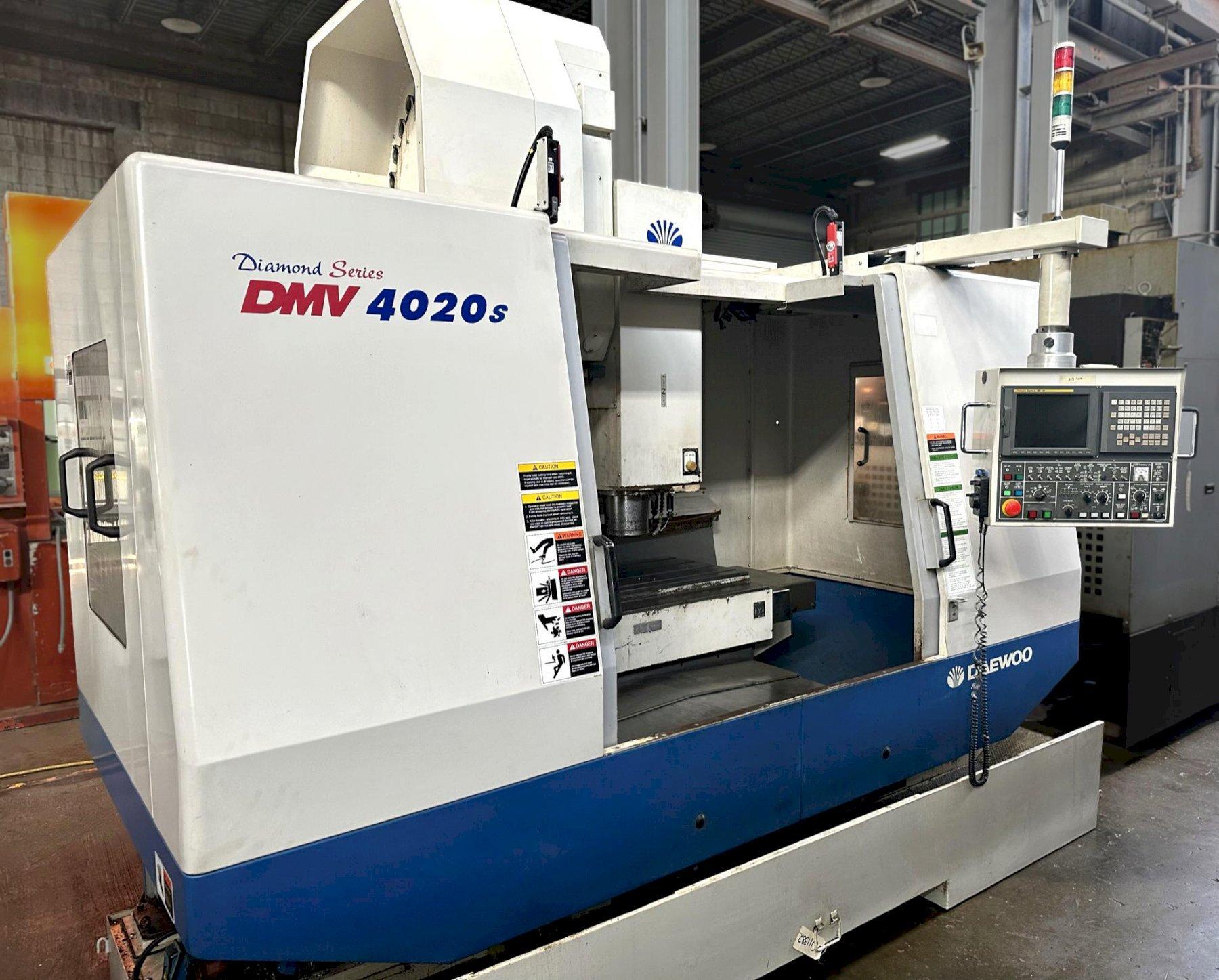 DAEWOO DMV-4020S CNC VERTICAL MACHINING CENTER, Fanuc 18iM CNC Control, 47" x 20" Table, X=40", Y=20", Z=20", CAT 40 Taper, 10,000 Max Spindle RPM, 30 ATC, Coolant System & Chip Pan, New 2002.