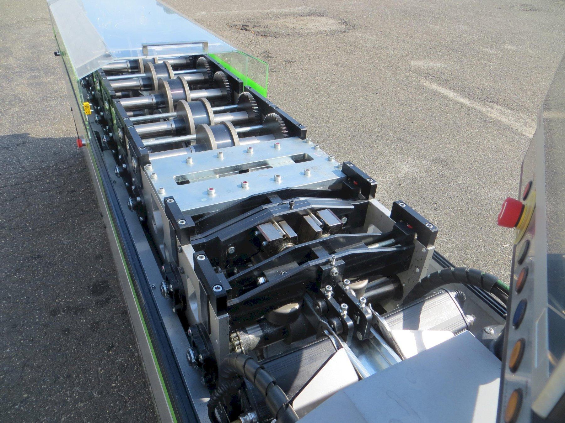FRAMECAD System - Model F325iT - Produces Wall Frames, Trusses and Joists for Residential and Light Commercial Buildings