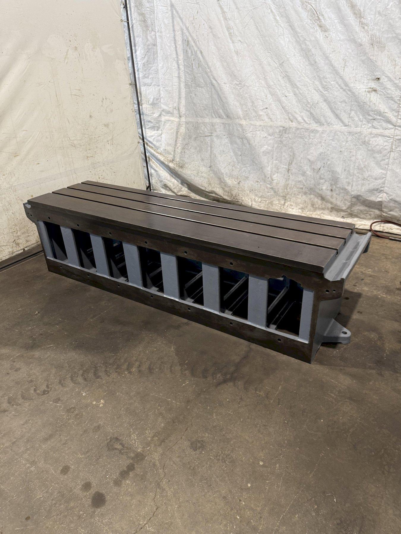 25" WIDE X 89" LONG X 24.5" TALL T-SLOTTED TABLE. STOCK # 0778825