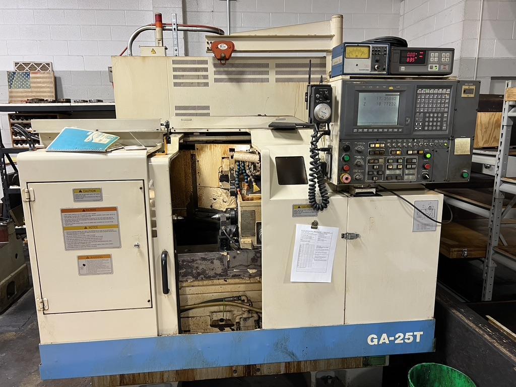 OKUMA GA-25T 13" X 13.75" CNC ANGLE GRINDER WITH FLAGGING, MARPOSS GAUGING, AND AUTO WHEEL BALANCING.