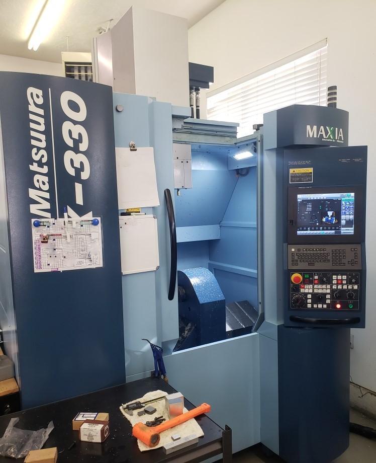 Matsuura MX-330 5-Axis VMC 2015, with: G-Tech 31i CNC Control, High Pressure Coolant, Laser Tool Probe, and Chip Conveyor.