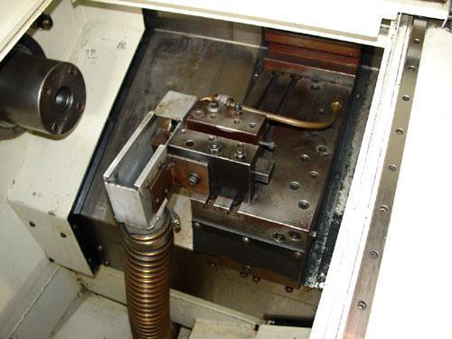 Wasino SG-5 CNC Gang Style, Fanuc 0TC CNC Control, 9" Swing, Collet Chuck, S. Robo-O Integrated Gantry Robot, Low Hours, 1999.