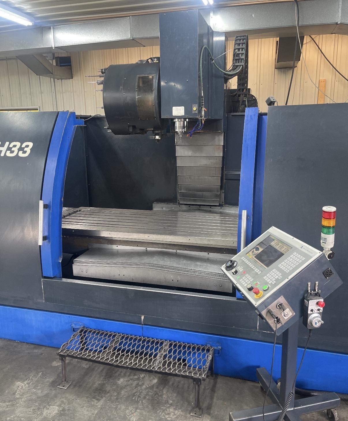 2019 MILLTRONICS RH33 Large Travel Vertical Machining Center with Arm ATC and Full Enclosure