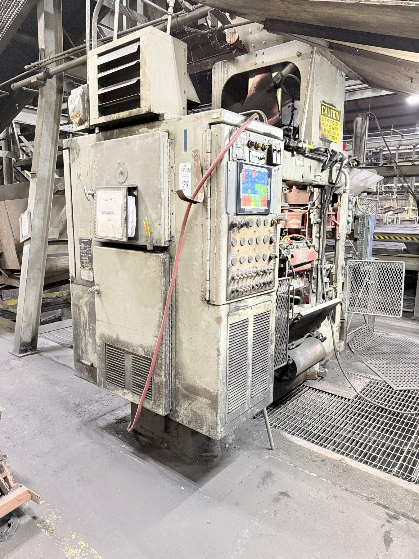 Hunter model hmp 10C automatic molding machine s/n 82P928, op. with Emerson PLC, feed belt