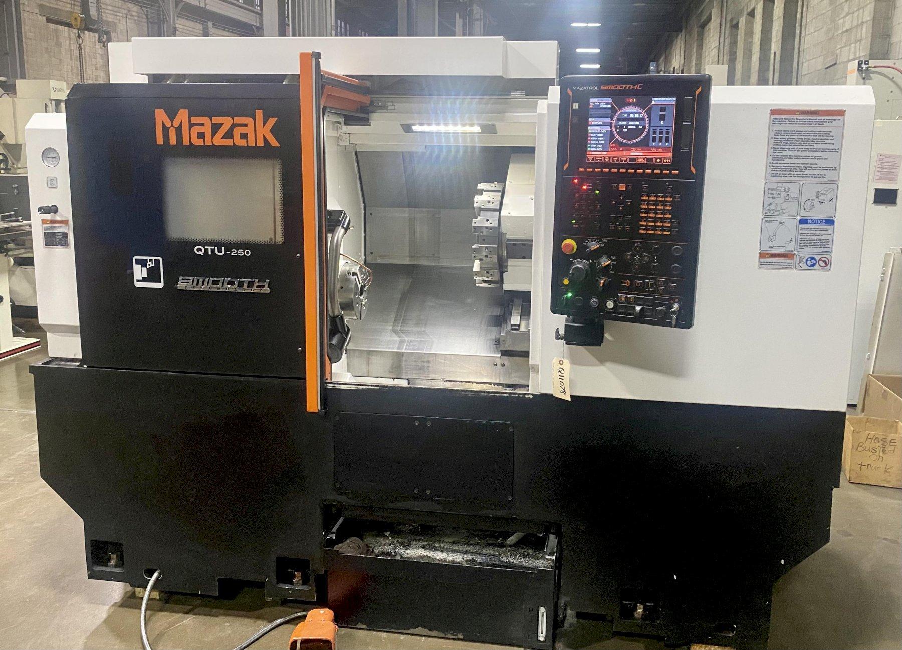MAZAK QTU-250 CNC TURNING CENTER, Mazatrol Smooth CNC Control, 8" 3-Jaw Chuck, 27" Swing, 24" Between Centers, 2" Bar Capacity, 20 HP Spindle, 4500 RPM, 12-Position Turret, Tool Setter, Auto Door, Chip Conveyor, New 2017.