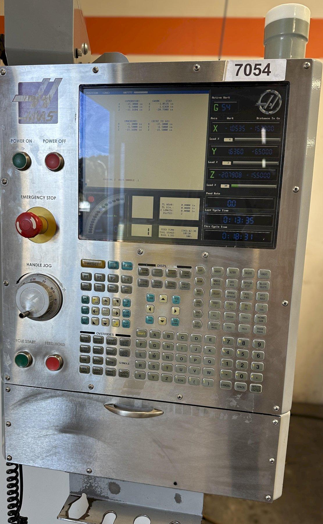 Haas VF-2D Vertical Machining Center 2007 With Rigid Tap, Remote Hand Jog, P-Cool, 4th Axis & 5th Axis Drives, 10,000 RPM Spindle, Chip Auger