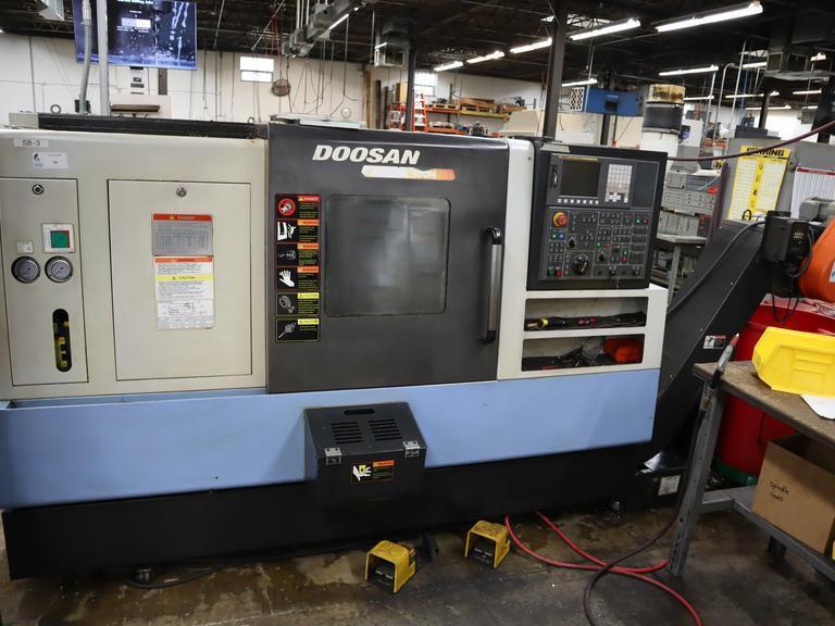 Doosan Lynx 300M CNC Turning Center with Live Milling, 12 Station Turret, 10" 3-Jaw Chuck, Tailstock, Tool Presetter, Parts Catcher, Chip Conveyor- Auction Item
