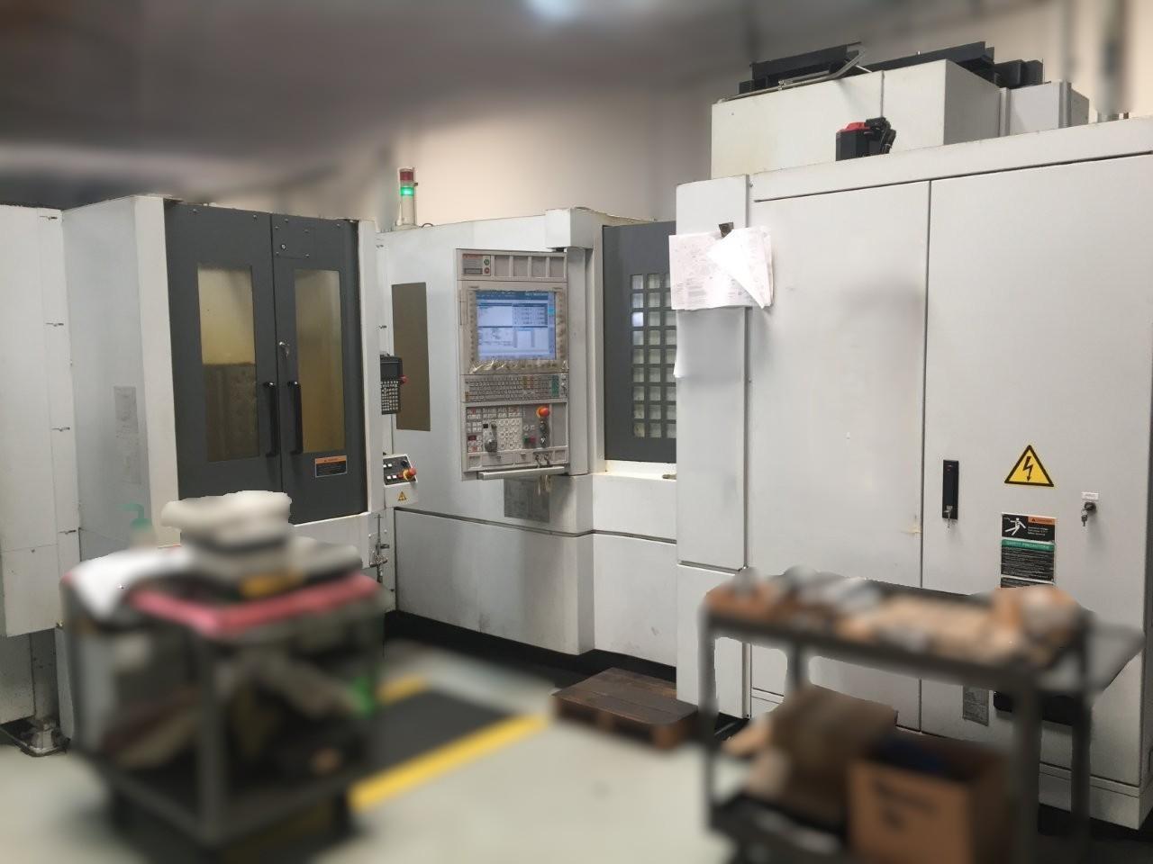 Mori Seiki NH4000DCG HMC 2010 - 6-Pallet FMS System, 4th Axis, 180 ATC