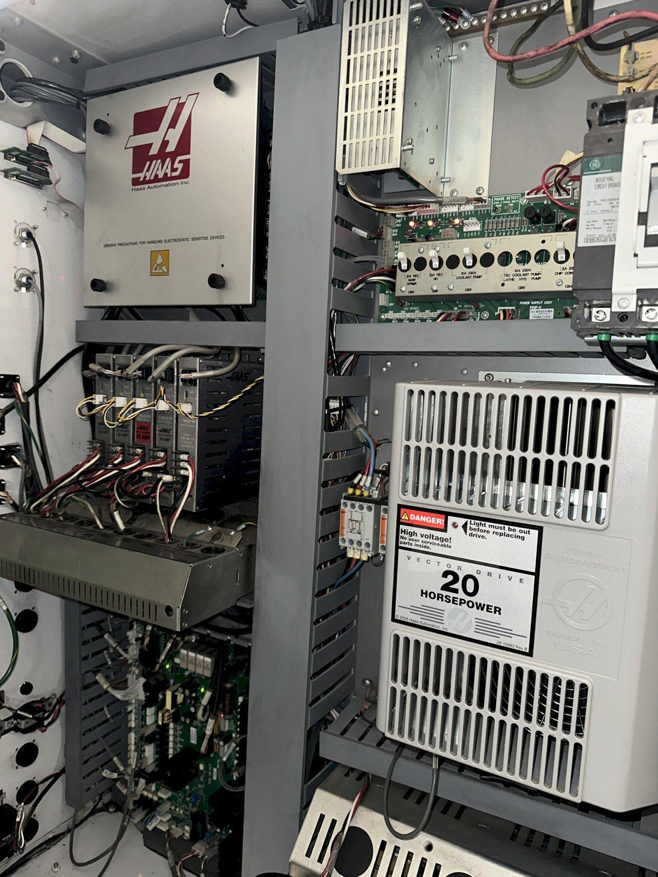 Haas VF-2D Vertical Machining Center 2007 With Rigid Tap, Remote Hand Jog, P-Cool, 4th Axis & 5th Axis Drives, 10,000 RPM Spindle, Chip Auger