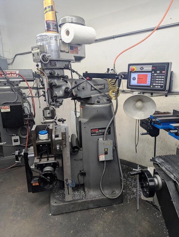 BRIDGEPORT VERTICAL MILLING MACHINE WITH PROTRAK EMX 2-AXIS CONTROL WITH 3-AXIS DIGITAL READOUT