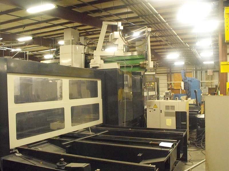 MAZAK V100 Versatech Mazak Mazatrol M32 CNC, (2) 78" x 157" Pallets, X=196",Y=127", Z=39", 50-Taper, 80 Station Tool Changer, Head Changer, New 1996.