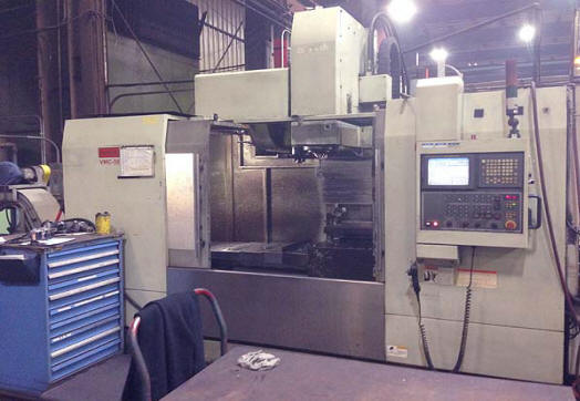 MONARCH VMC-50 CNC VERTICAL MACHINING CENTER, Fanuc 18iMB CNC Control, 56" x 27" Table, X=51", Y=25.6", Z=27", 50 Taper, 4000 RPM, Midaco `add-on' Pallet Shuttle, New 2007.