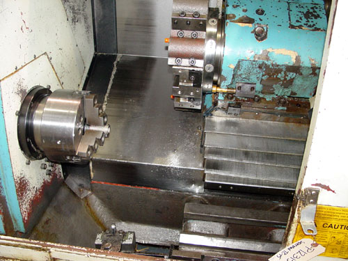 SUPERMAX YCM TC-15, Fanuc OT, Barfeeder, 18" Swing, 8" 3-Jaw Power Chuck, Tailstock w/ 18" Centers, Chip Conveyor, 2000.