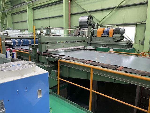 72" (1850mm) x 3.2mm x 55,000# Slitting Line with Automatic Tooling and Knife Setup Year 2007