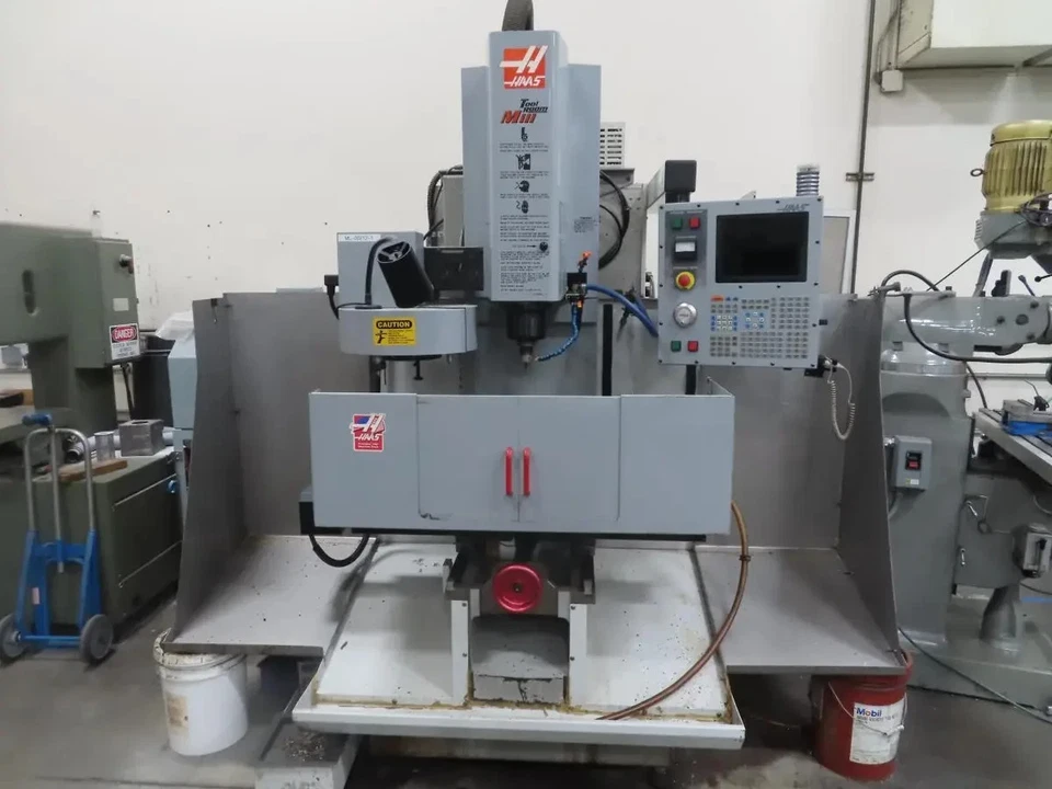 2002 Haas TM-1 CNC Vertical Machining Center, 30"x12"x16" Travel, 4,000 RPM, 10-Slot ATC, 7.5 HP FOB Portland, OR $10,500