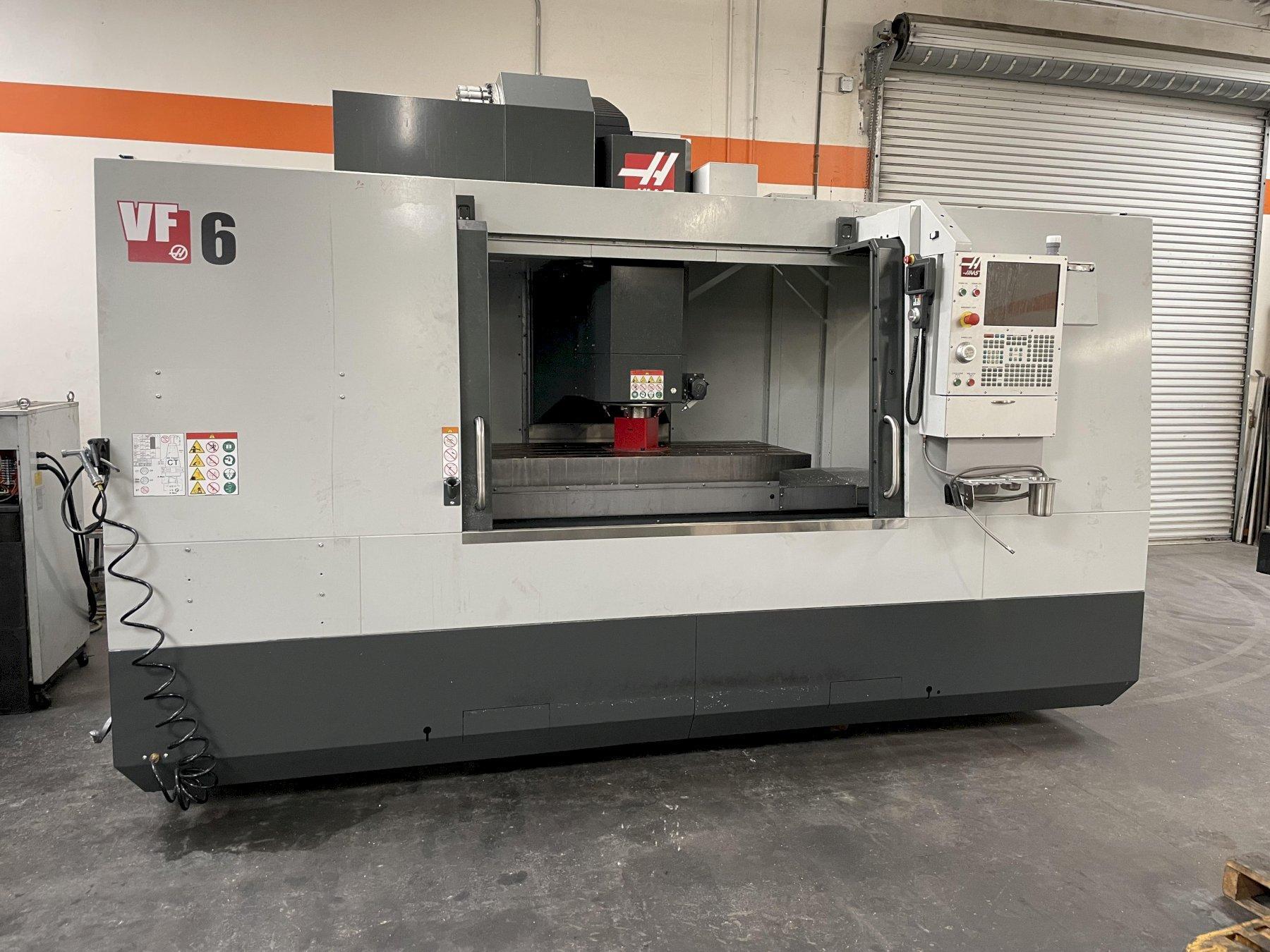 Haas VF-6/40 CNC Vertical Machining Center, Yr. 2022, 10,000 RPM Spindle, Remote Hand Jog, Programable Coolant, Chip Auger, Chip Strainer,