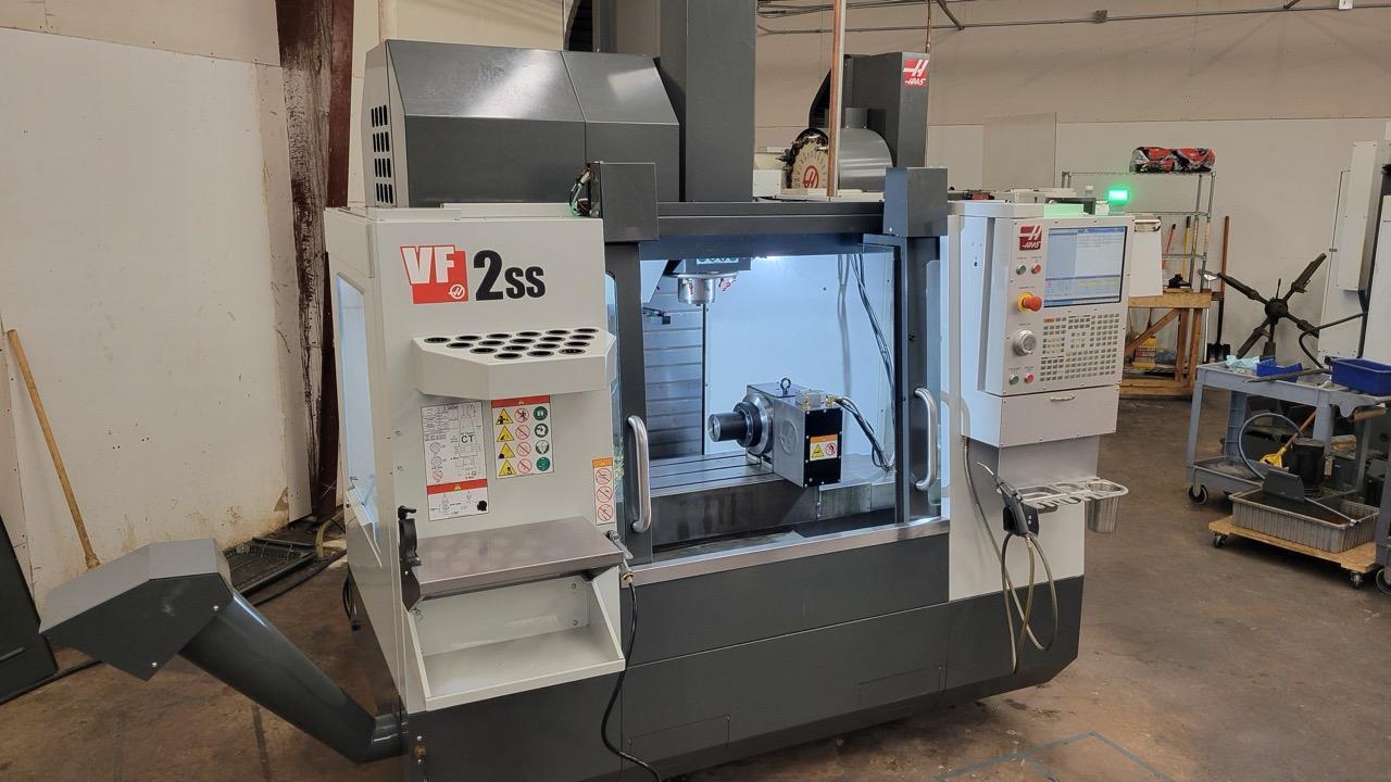 Haas VF-2SS VMC, 2021 – 4th Axis Rotary Table, Multi-Auger Chip Removal, Auto Door