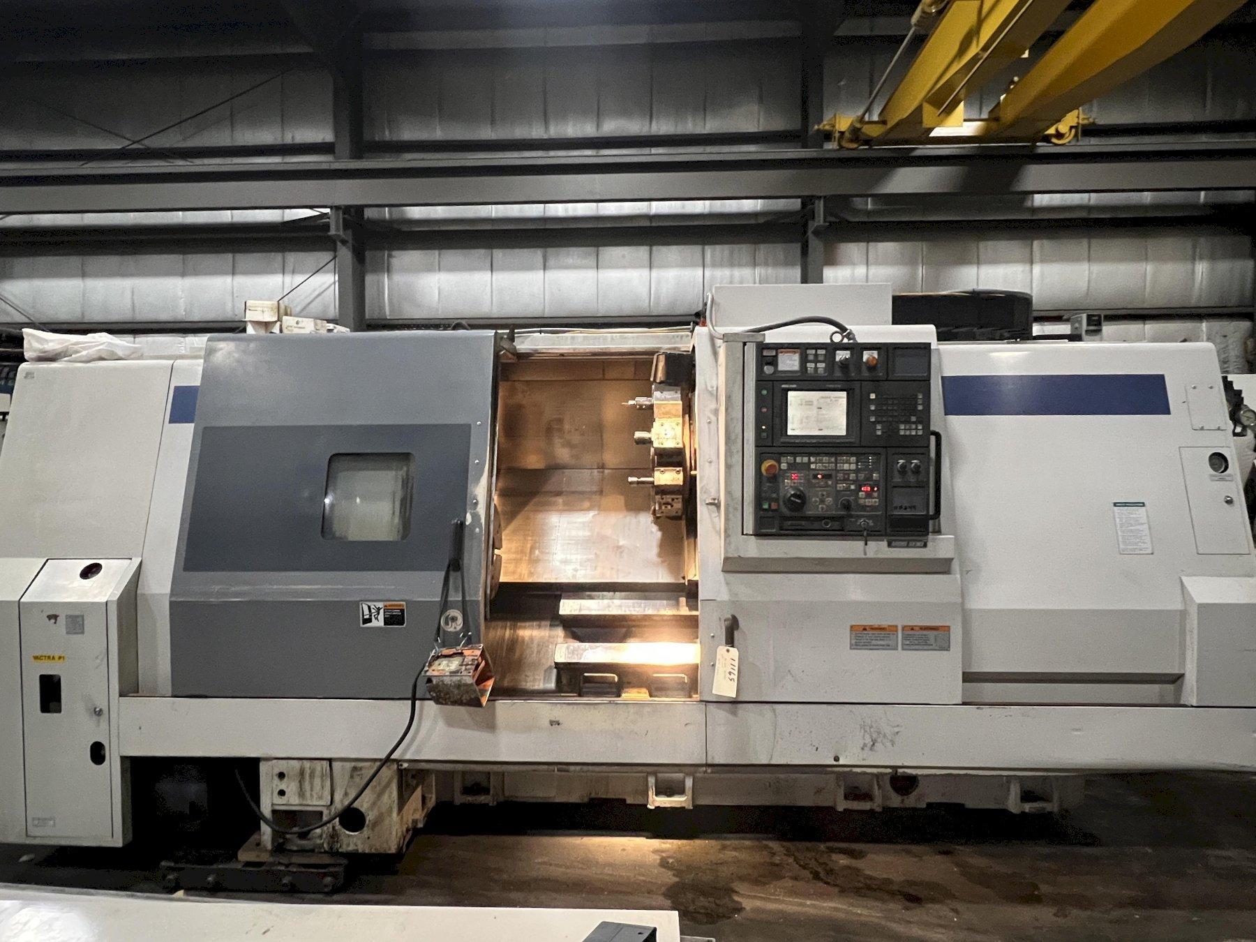 MORI SEIKI SL-35B/1500, FANUC 18TC, 23.6" SWING, 4" HOLE, 64" CENTERS, CHIP, 15" SMW THRU HOLE CHUCK,  TOOLING, '99