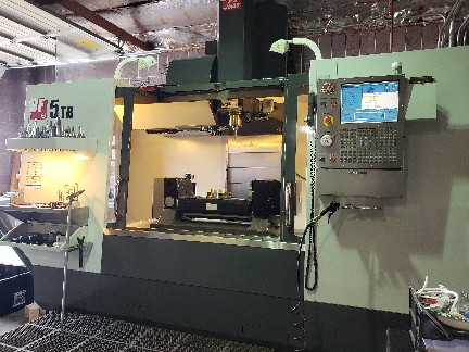 Haas VF-5/40TR VMC 2012, with: TR210 Trunnion Rotary, High Speed Machining, Prog. Coolant Nozzle, 750MB Memory, RJH, and Rigid Tap.