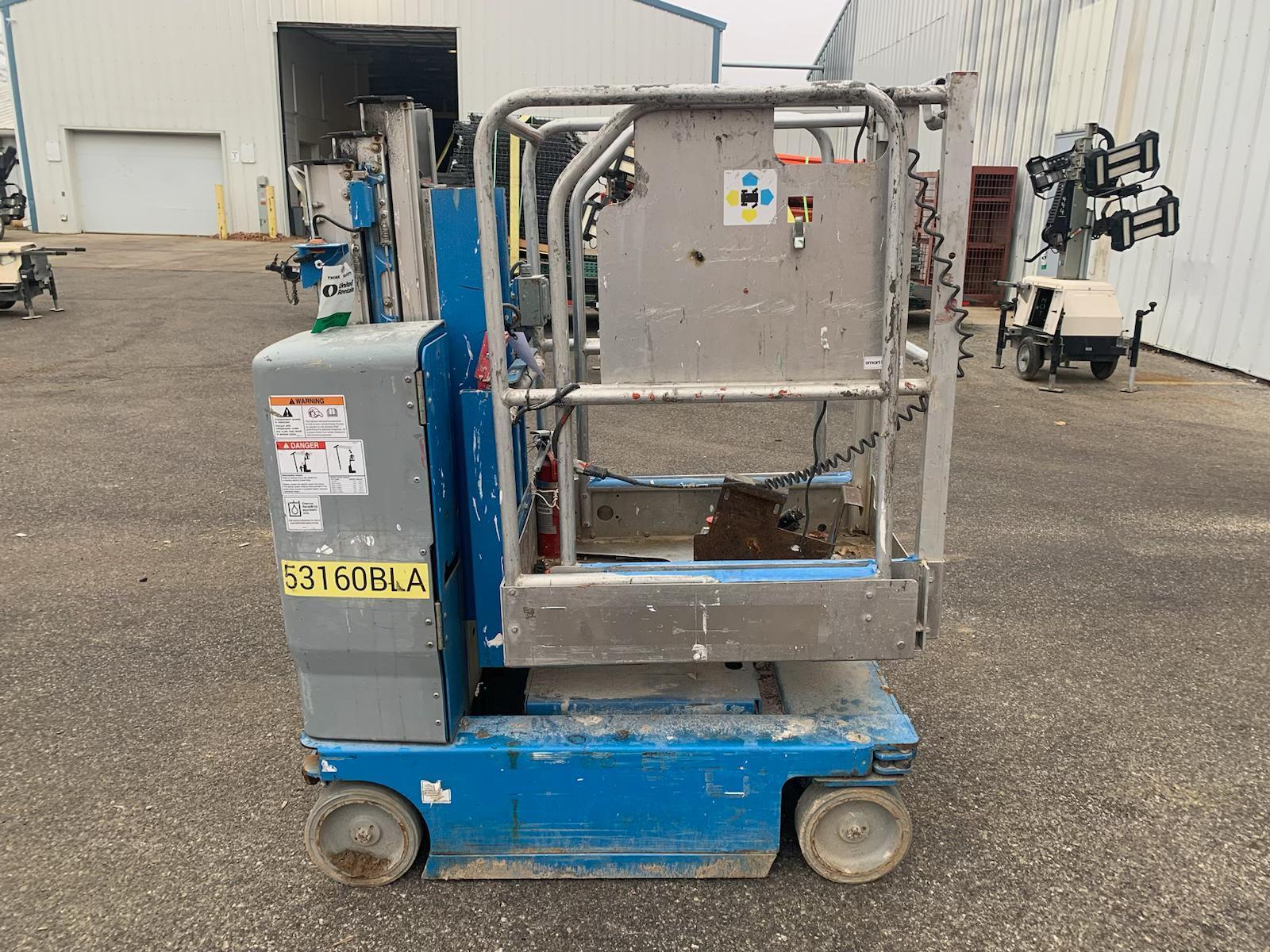 1 - PREOWNED GENIE SCISSOR LIFT, MODEL #:GR-12, S/N: GRP-50403