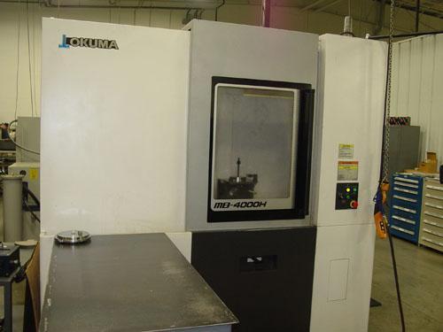 OKUMA MB-4000H CNC HORIZONTAL MACHINING CENTER, OSP -P300M CNC Control, X=22.05", Y=22.05", Z=24.61", Cat-40 Taper, 22 HP, 15000 Max Spindle RPM, ATC, Chip Conveyor, Coolant System, New 2013.