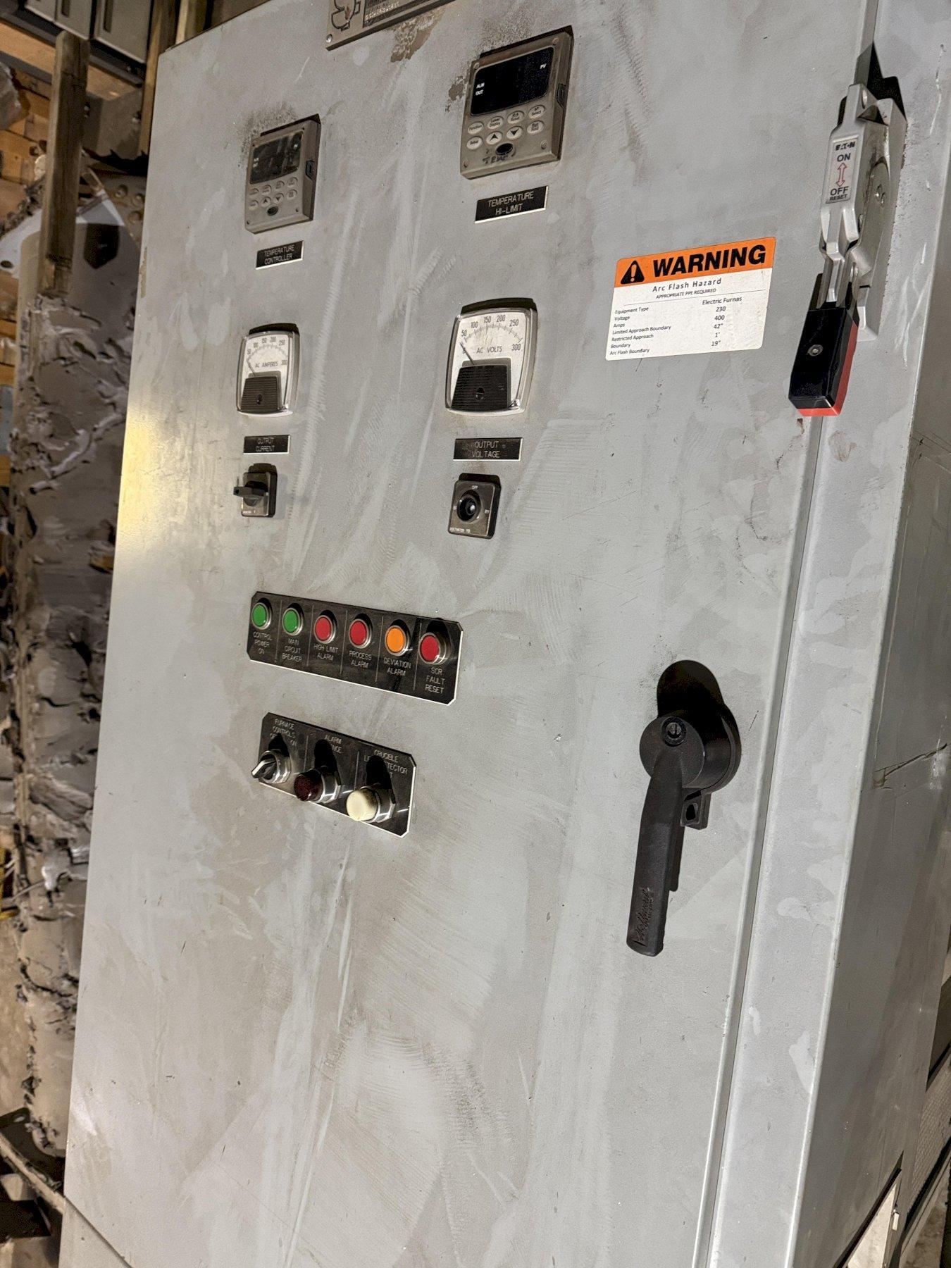 2014 Schaefer 1000# electric motorized nose pour furnace s/n 001-1213-0280 rated at 85kw with controls