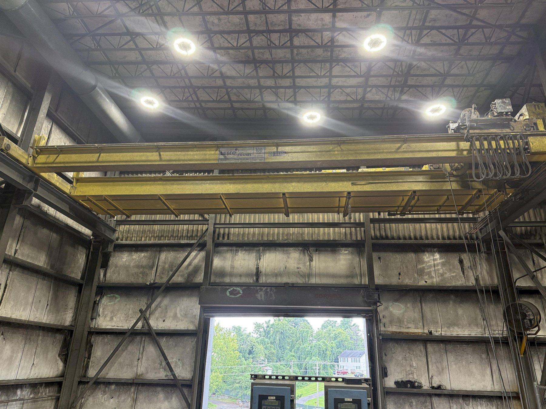 2021 Uesco 10 ton top running bridge crane s/n 21-4861, approx. 50' span, radio controlled, equipped with magnet controls