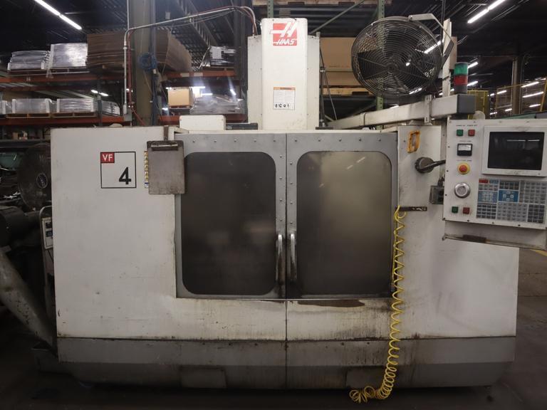 Haas VF-4 CNC Vertical Machining Center, 20 Station Carousel  Tool Changer, 7500 RPM Spindle, Chip Auger, Programmable Coolant- Auction Item