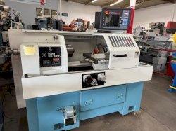 SOUTHWESTERN INDUSTRIES TRAK 1630SX FLAT BED CNC LATHE
