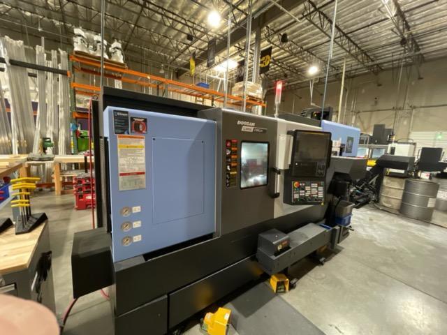 Doosan Lynx 2100LSYB Multi-Axis CNC Lathe 2020 with: Fanuc i Series CNC Control, Live Tooling, Royal Collet Chucks, Collets, Tool Setter, Y-Axis, and Chip Conveyor.