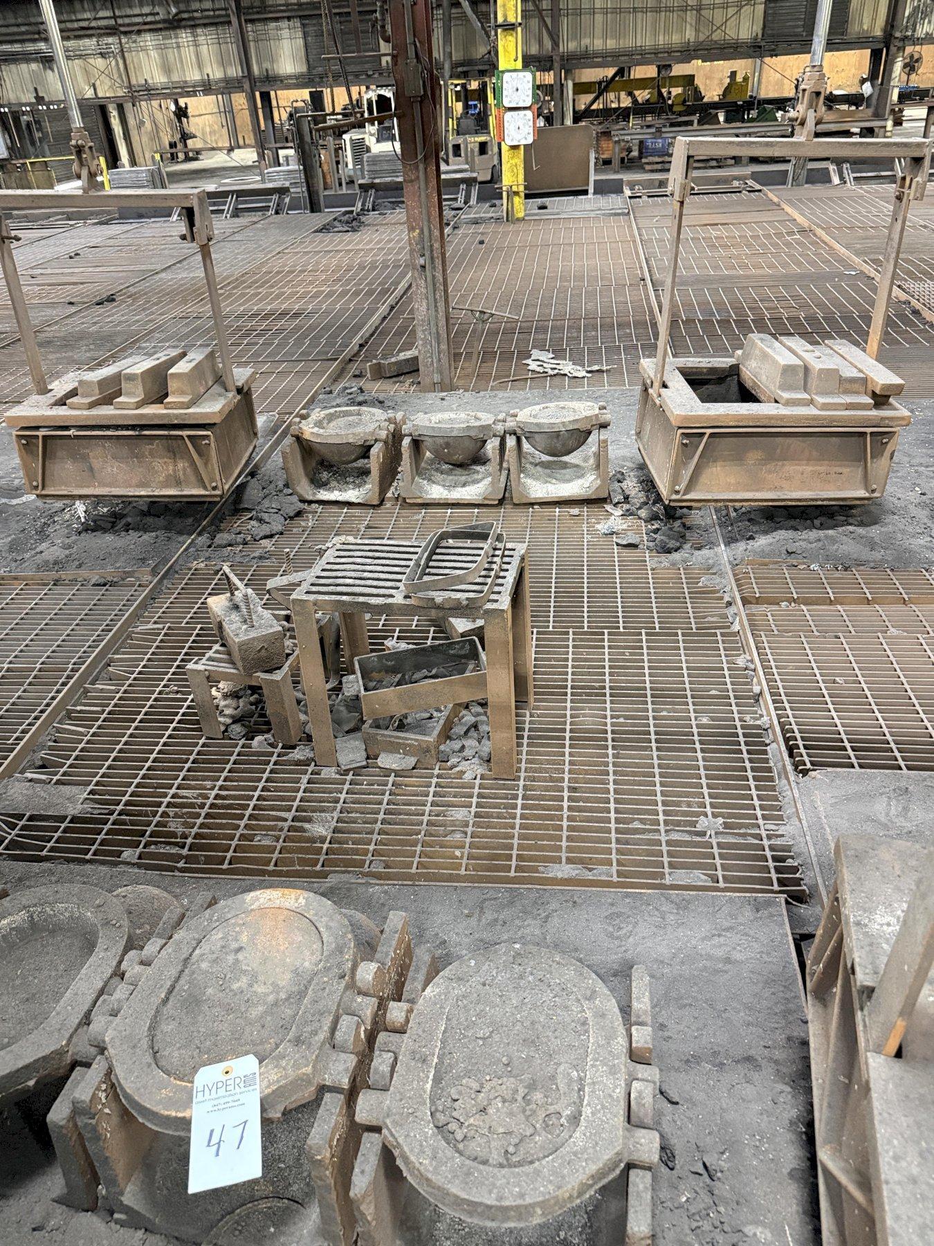 7- single pig mold stands
