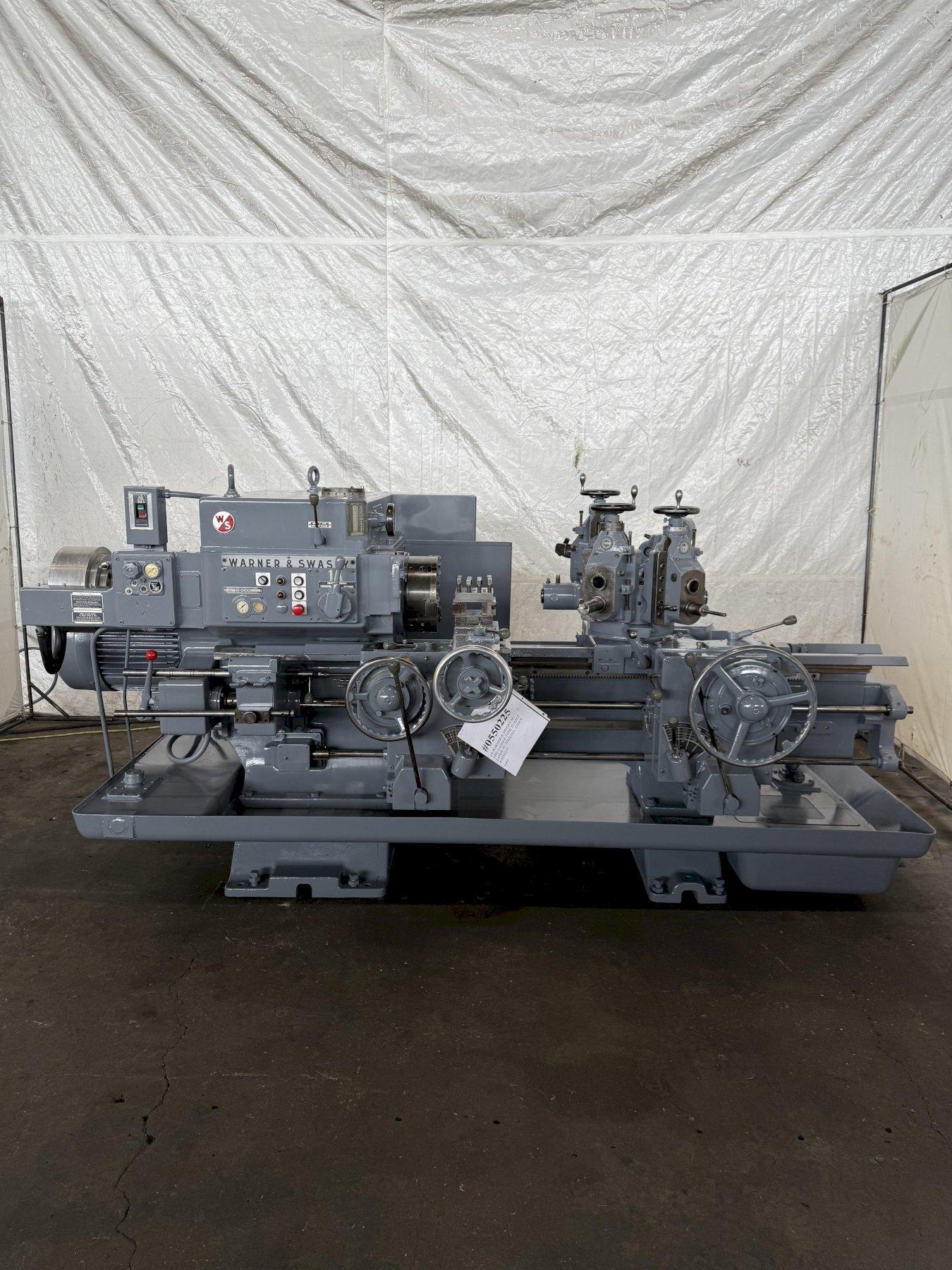 1A WARNER & SWASEY M–3400 SADDLE-TYPE TURRET LATHE W/ TOOLING. STOCK # 0550225
