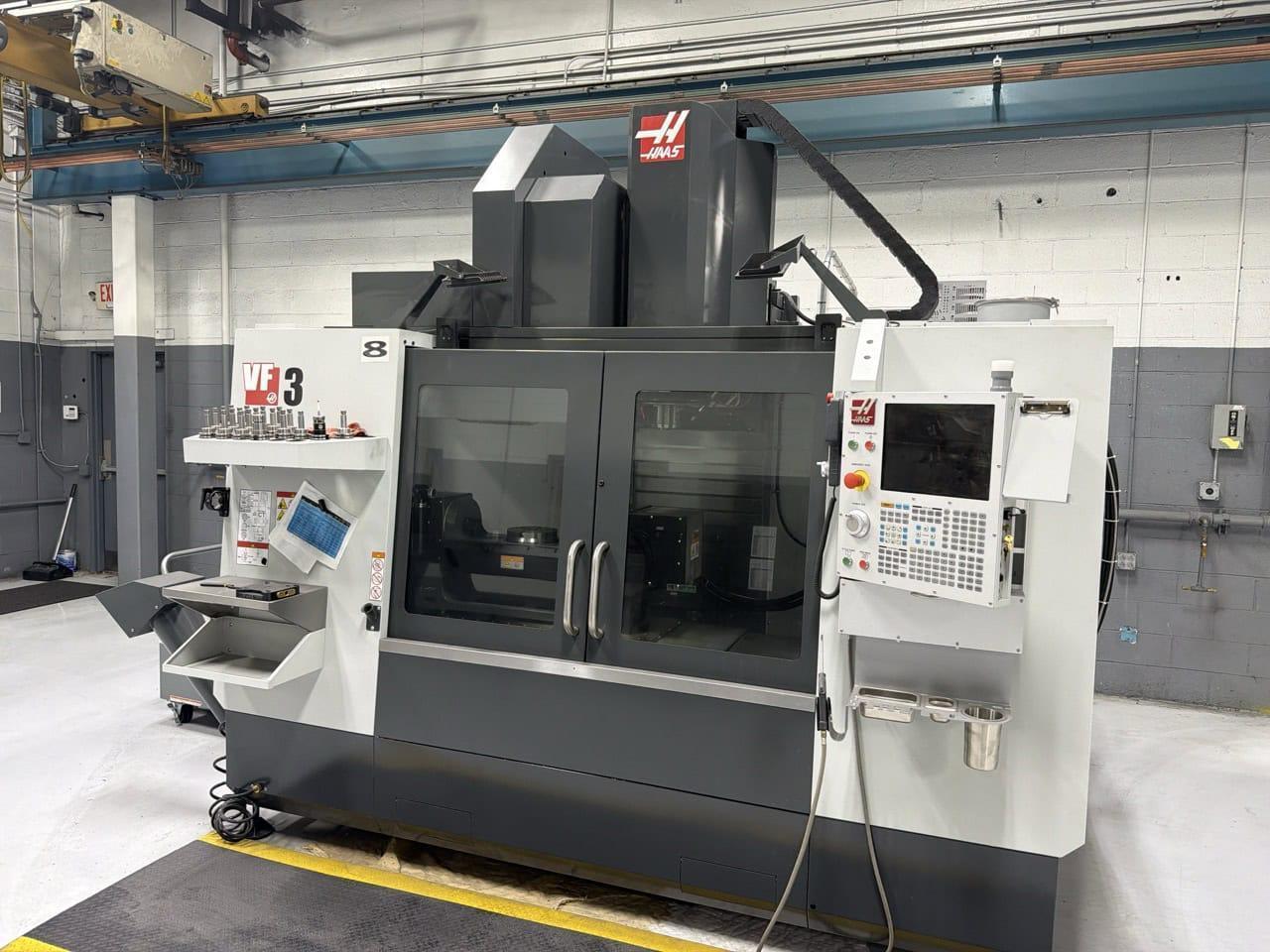 Haas VF-3 VMC, 2021 – TR-210 5th Axis, 50 ATC, WIPS, HSM, 15K RPM, Chip Auger
